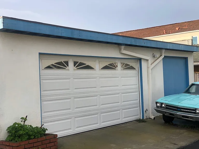 2 CAR GARAGE ENTRANCE ON WAVECREST