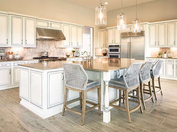 The kitchen is complete with an over-sized pantry and plenty of overhead lighting
