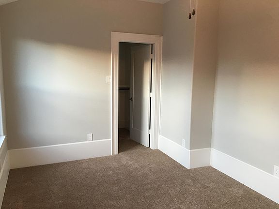 Bedroom with walk-in closet