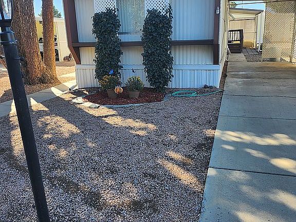 Front view, carport/driveway