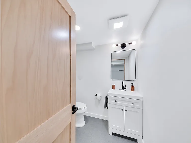 Lower level full bathroom with walk-in shower.