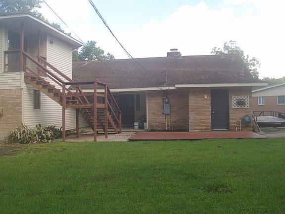 Large, secluded backyard with expansive area for kids and entertainment