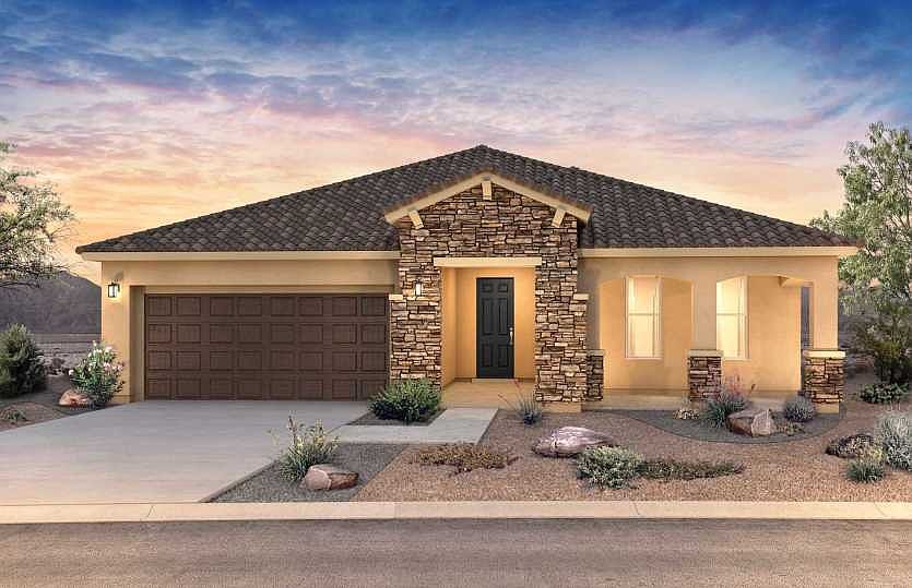 Stone accents this spacious single-story home exterior with tasteful color selections.