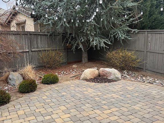 In ground fire pit with overhead lights.