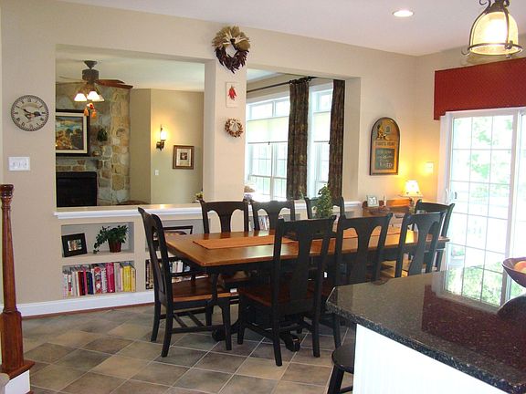 breakfast nook with wall shelves