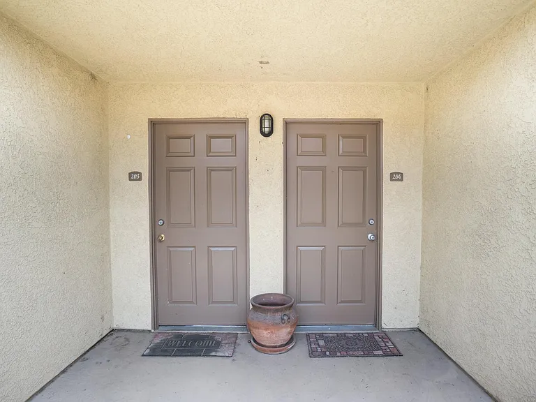 Walk up to the second floor and the door to the right is the door to your new private condo.