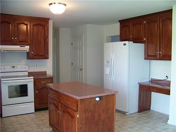 Lovely Cabinetry and White Appliances