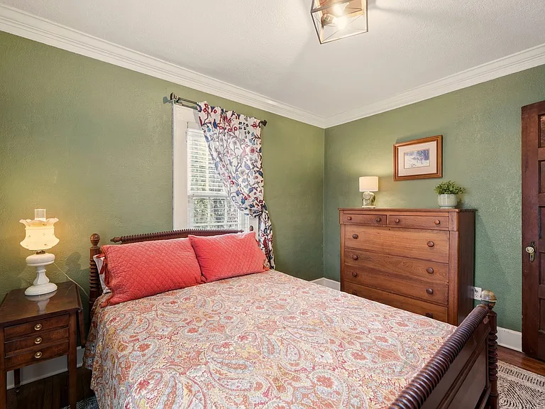 Full size bed with new mattress. There is ample storage and closet space