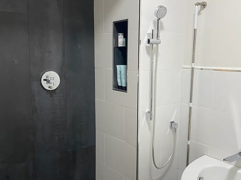 First-floor wet room with shower and jetted tub