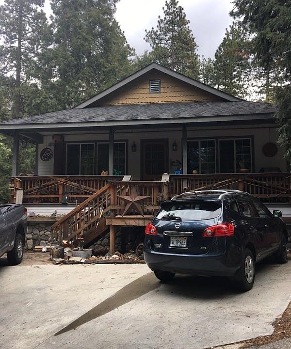front of house with full porch
