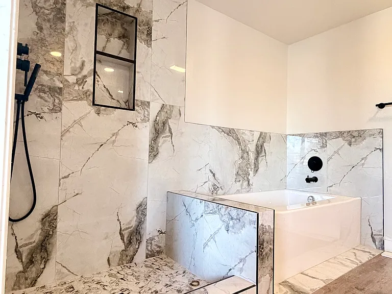 Newly renovated bathroom. Shower glass to be installed before move in