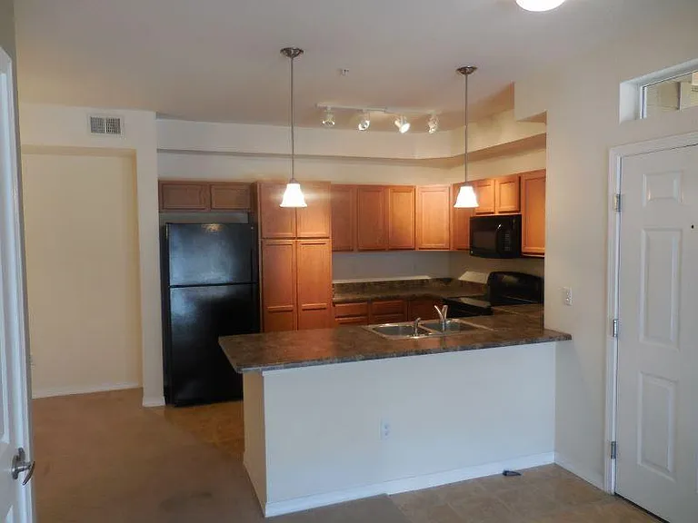 Kitchen w/breakfast bar. New Finger Print free stainless LG refrig coming!