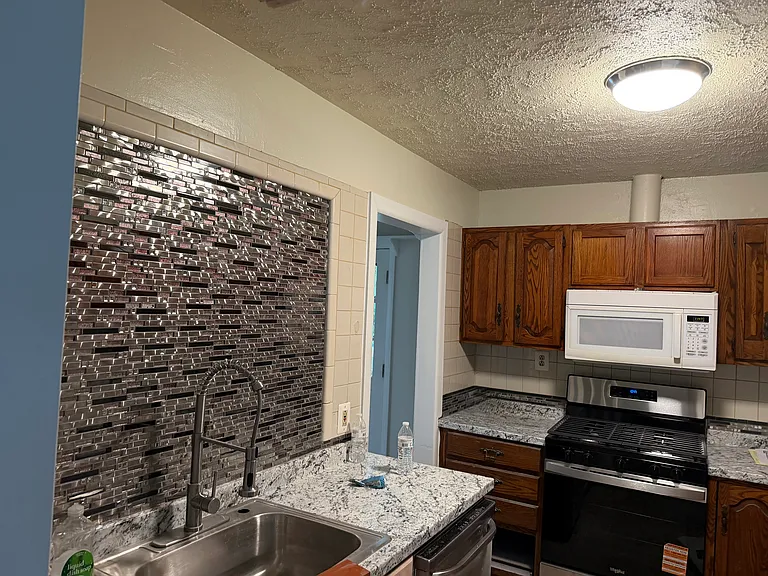 7507 Magarity Rd — Photo 8