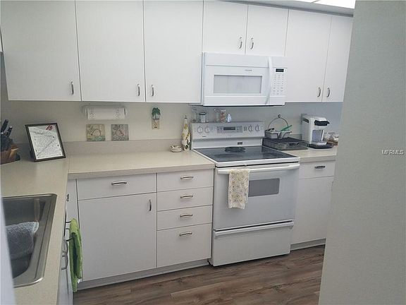 5th image of 9461 Harbor Greens Way APT 302
