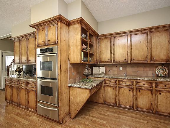 Additional closer view details specifics of versatility. Shelving for cookbooks or whatever you like above counter that can be used for desk.