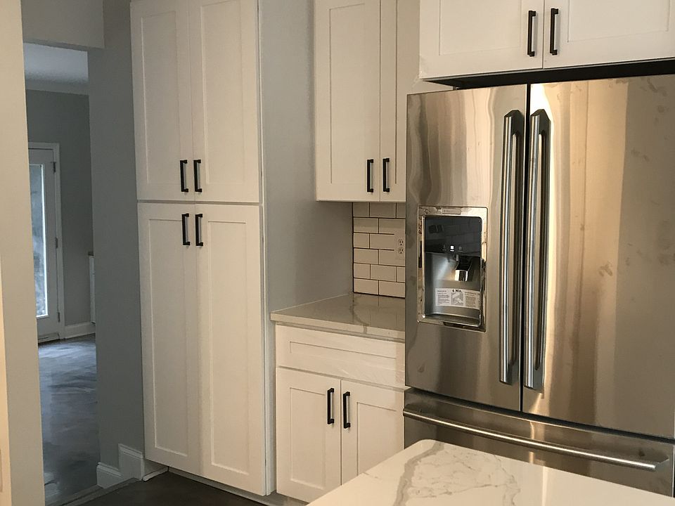 kitchen leads into living area