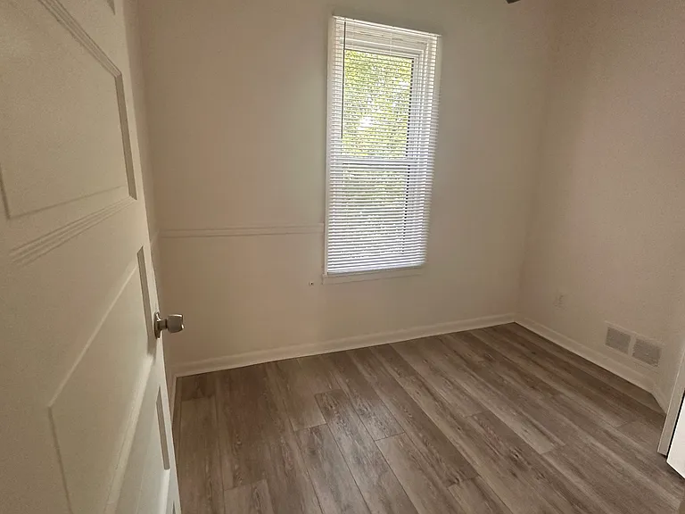 Den (0.5 bed). Tenant could utilize as office space or kids' room