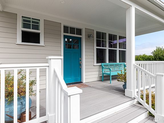 Front porch catches all the morning sun. Enjoy your morning coffee overlooking the park.
