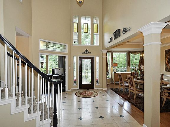 Alternate view of entry showcasing decorative windows and open floorplan