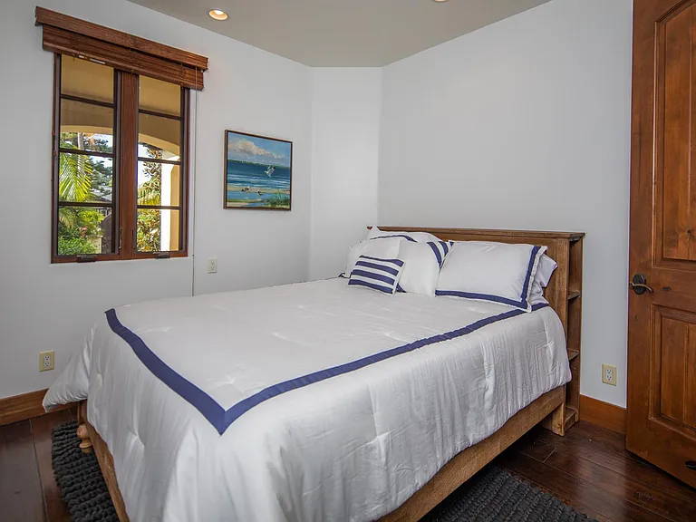 Downstairs / entry level bedroom - queen bed - full bath in hallway