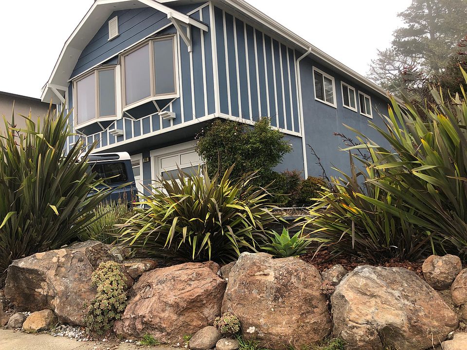 Front, side yard boulder and stone walls