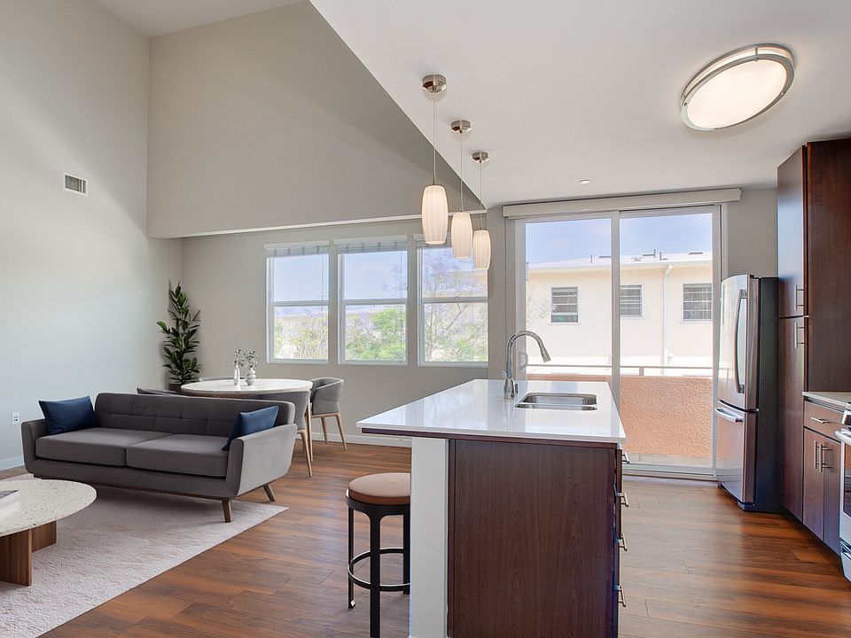 Limited edition floor plans feature stainless steel appliances, quartz countertops, and soft-close designer cabinets