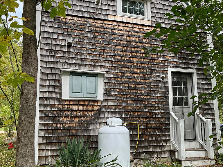 Side door from bedroom, propane tank