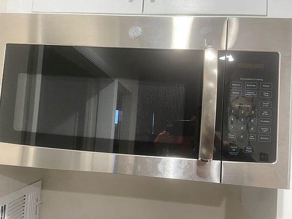 Interior -- Microwave -- Good Sized and Stainless Steel.