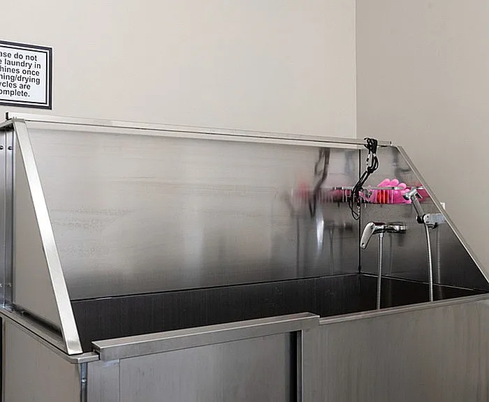 Experience the convenience of this modern pet washing station, perfect for your furry friends.