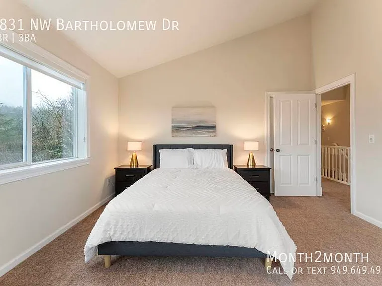 9831 NW Bartholomew Dr — Photo 17