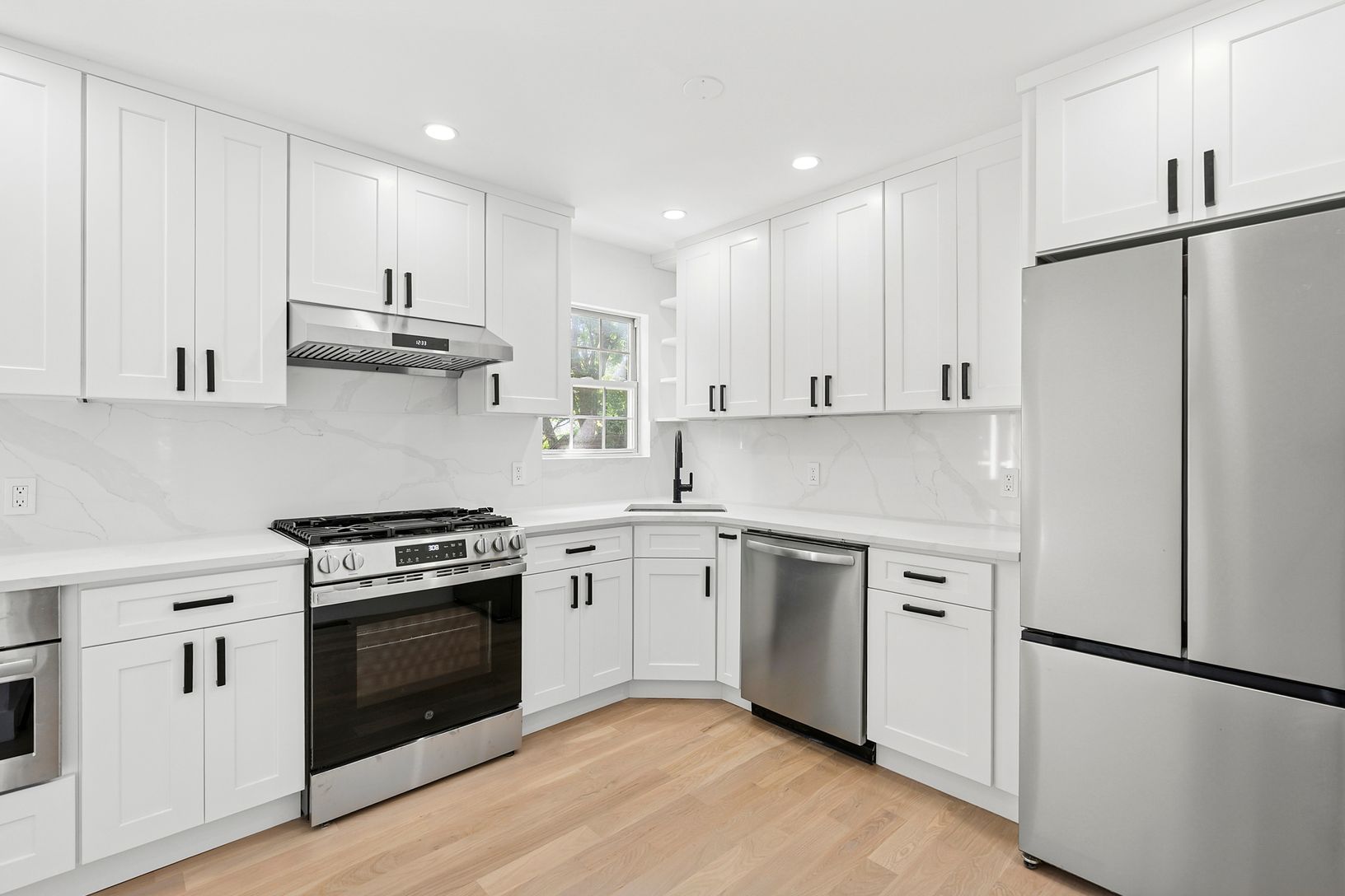  CUSTOM CABINETS AND WINDOWED KITCHEN