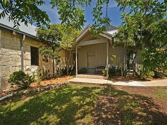 This covered front entry is a charming welcome.