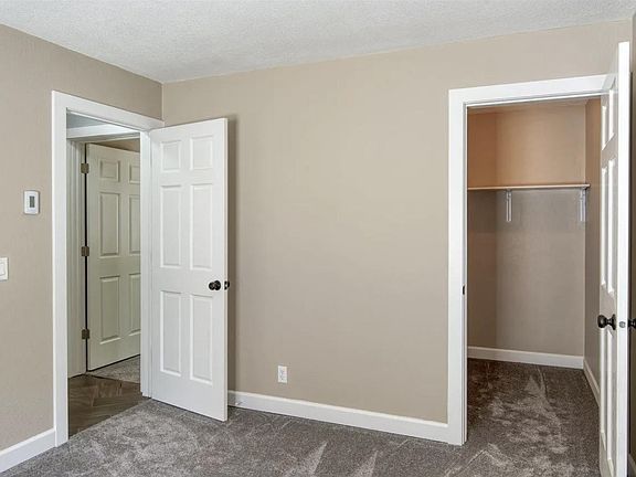 bedroom 2 with walk in closet