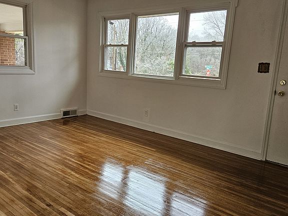 Sitting room with big windows and nice views.