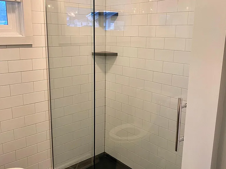 Shower with hand held shower head