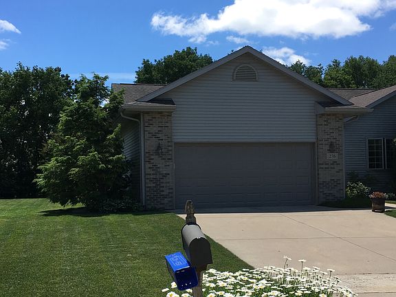 Garage with Daisy's Blooming