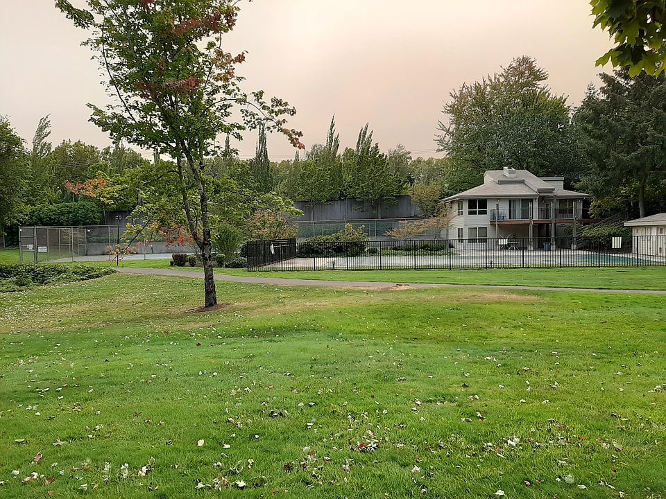 The community is filled with open green spaces, trees, paved walking trails, and beautifully maintained landscaping. Here is our clubhouse with private tennis court and pool (plus there is a second pool).