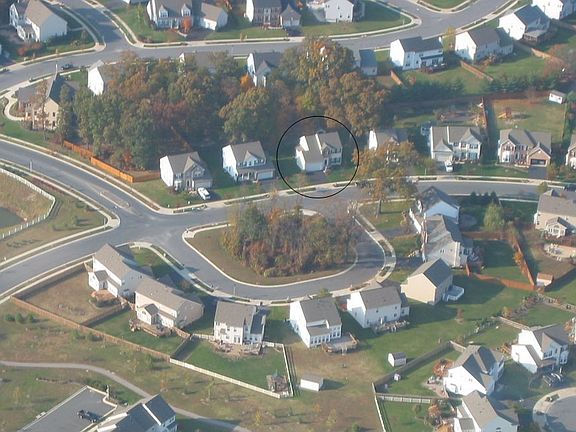 Home is circled top center of picture.  Tot lot visible in lower left and part of the walking trail at the bottom.