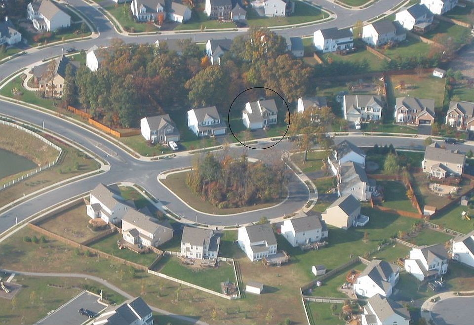 Home is circled top center of picture.  Tot lot visible in lower left and part of the walking trail at the bottom.