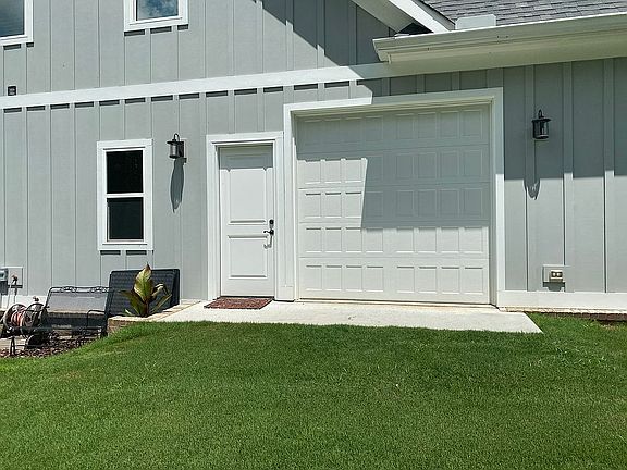 3rd Garage with sloped land