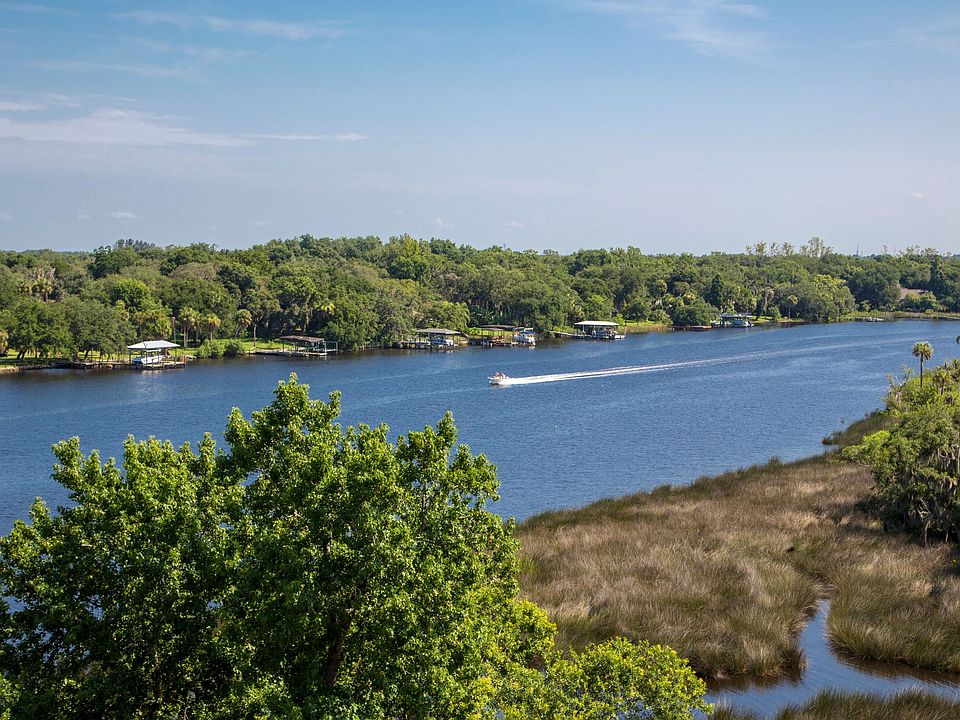 Marvel at the daily accessibility of serene river scenes and peaceful preserve landscapes to escape to just steps from our tranquil community.