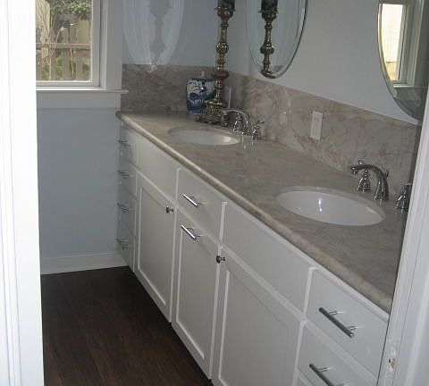 Bathroom: double sinks and marble