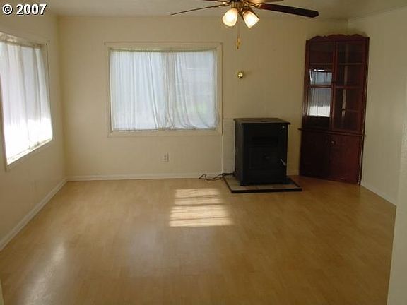LIVING ROOM W/ NEW PERGO FLOORS