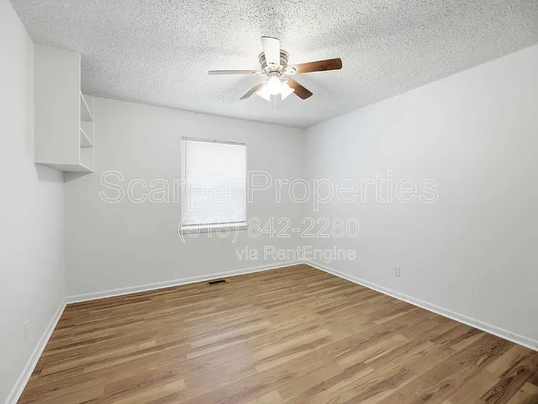313 E Woodrow Pl — Photo 19