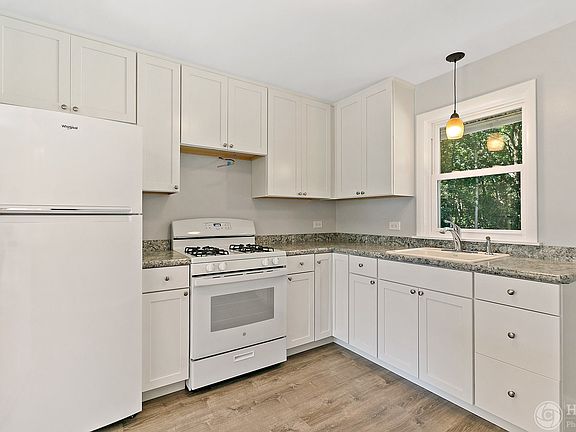 Brand new refrigerator and stove....just add a hood or microwave above the stove.
