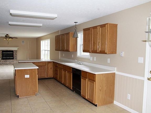 Large breakfast room with access to screened patio, and open to kitchen. Center island with electric. Pantry too.