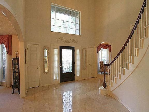 Two story ceilings really open up the entryway
