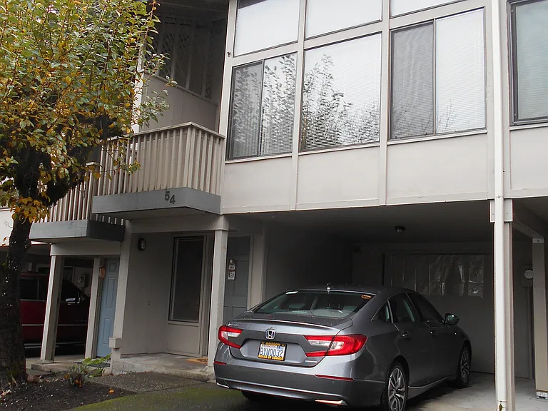Condo has a one car garage with storage area, parking on driveway, and
parking across the street by the creek.