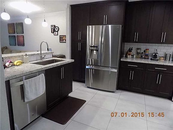 4th image of 10112 Royal Palm Blvd #103-1