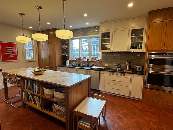 Completely renovated kitchen with induction stove and luxury appliances